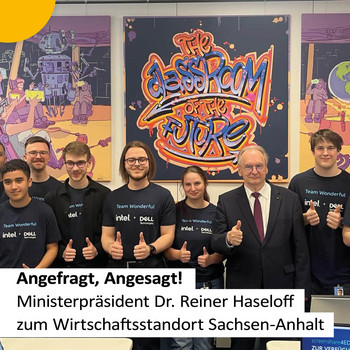 Das Bild zeigt Ministerpräsident Dr. Reiner Haseloff mit jungen Menschen.
