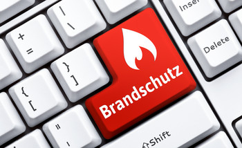 Das Bild zeigt eine Computertaste mit der Aufschrift Brandschutz.